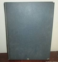 Front view of plain hardcover binder