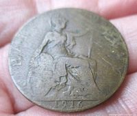 Reverse of 1917 half penny showing seated Britannia and date