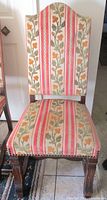 Full view of upholstered French highback chair