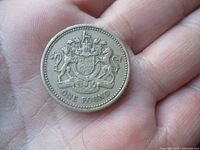 Reverse showing Royal Arms and ONE POUND legend