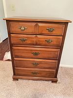 Front view of dresser showing all six drawers and hardware