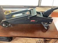 Left side view of Cross Road II hydraulic floor jack