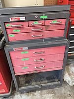 Front view of closed tool chest showing drawers and missing bottom panel