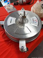 Top view showing entire stainless steel pressure washer unit with quick connect fitting and wheels