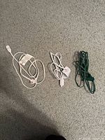 All three extension cords laid out to show color and plugs