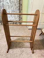 Front view showing full rack with five rails and end panels