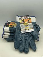 Stack of blue nitrile-coated gloves with tag visible