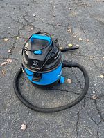 Full view of DuraVac vacuum with hose coiled