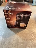 Front of boxed Keurig K-Duo Essentials coffee maker