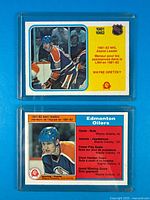 Fronts of both 1981-82 O-Pee-Chee Wayne Gretzky cards in sleeves