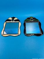 both stained glass mirrors front view