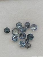 Close-up of loose round alexandrite stones
