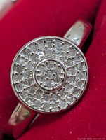 Front view of ring showing full pavé diamond face