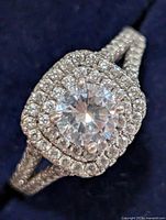 Top view showing round centre CZ, double halo and split shank