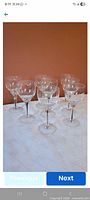Eight Belfor Exquisite Line white wine glasses on table