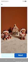 Front view of two teddy bear shakers and cottage sugar pot