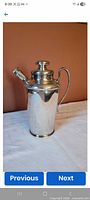 Shaker fully assembled, showing profile and handle