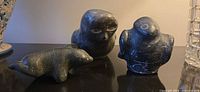 All three soapstone carvings together