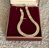 Full bracelet displayed in velvet-lined box