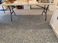 Full view of folding table with legs extended