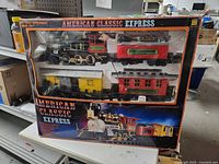 Front of boxed American Classic Express train set showing locomotive, rolling stock and track