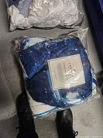 Lanmodi blue and white comforter in clear packaging