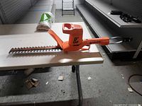 Full view of Black & Decker hedge trimmer on table