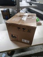 Entire sealed carton with handling icons and UN3481 label