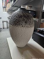 Full view of vase left side showing gradient glaze and texture