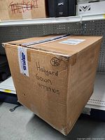 Closed shipping carton labeled Halyard Gown 41737NS