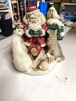 Front view of Santa figurine with animals