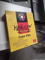 Front of Kodak-style slipcase with title and author