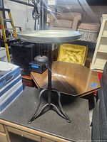 Full view of metal tray-top side table