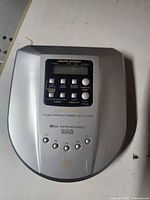 Top view showing controls, LCD, branding and SAS marking