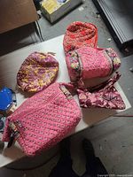 Group shot of all five Vera Bradley quilted bags