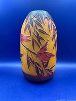 Front view showing birds and branch motif on yellow background