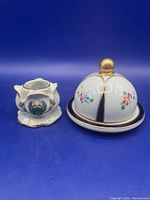 Butter dish and candle holder side by side