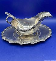 Gravy boat on under-tray with ladle in place