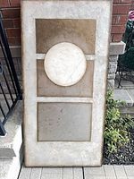 Front view of geometric wall art panel showing overall design and condition