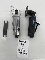 Both air tools laid out with cut-off tool, angle grinder and spanner