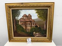 Front view of framed oil painting