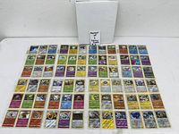 Binder and eight sheets of Pokémon foil cards displayed