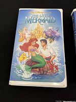 Front view of one clamshell case showing error artwork