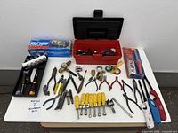 Overall view of all tools and accessories laid out on table