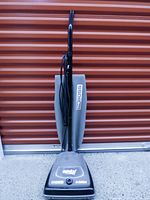 Full view of Eureka upright vacuum standing upright