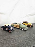 Group shot of three Hubley Lancaster die-cast cars