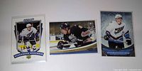 Front view of three Alexander Ovechkin hockey cards