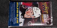 Front of sealed Upper Deck 2020-21 Hockey Extended Series pack showing player image and branding