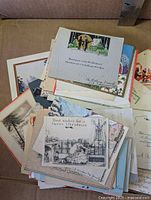stack of vintage Christmas cards showing various illustrated fronts