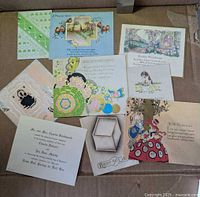 All nine cards laid out on cardboard backing
